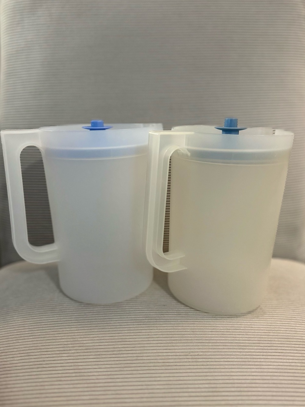 Set of 2 - vintage Tupperware push-button pitchers